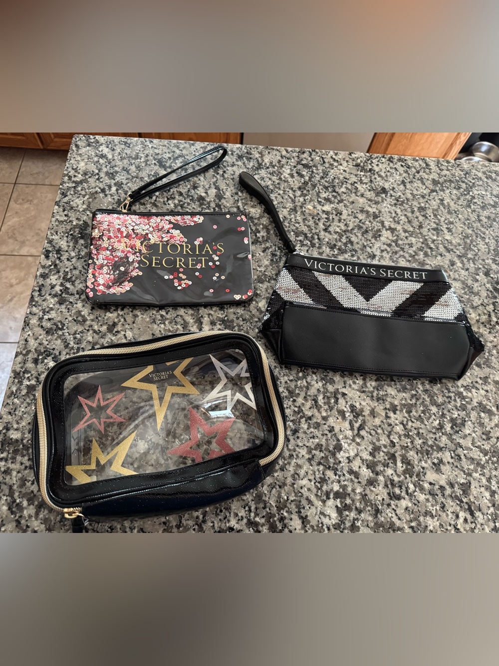 Lot of 3 piece NWOT Victoria's Secret Black & Pink Sequin Floral Wristlet Trio